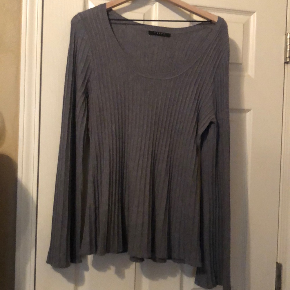 Grey sweater bell sleeve with flair at the bottom